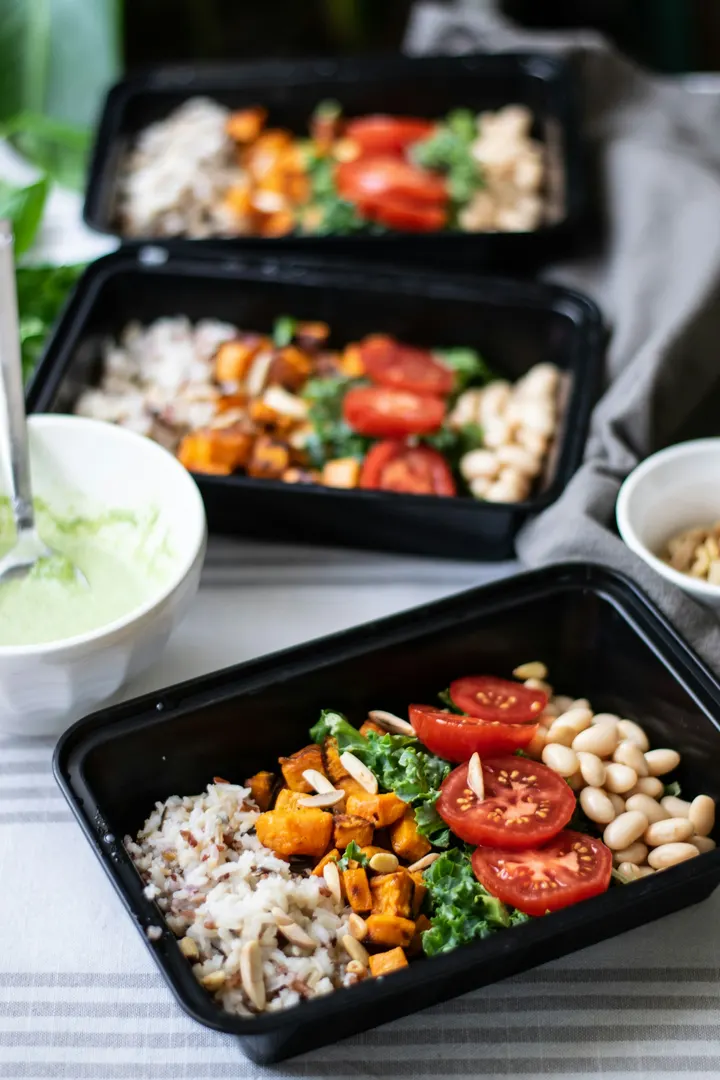 Wild rice bowls with roasted sweet potato, tomato and white beans